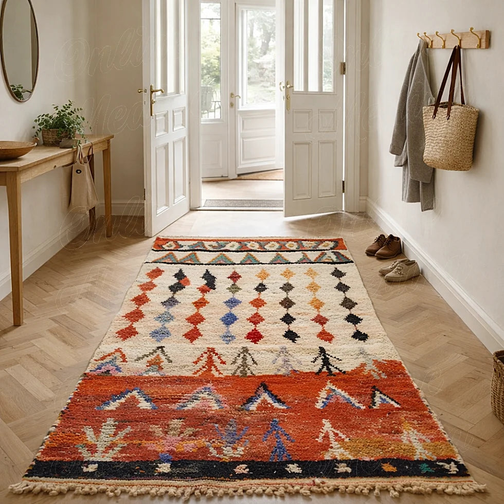 Traditional Moroccan Azilal rug with colorful geometric symbols placed in a hallway entrance