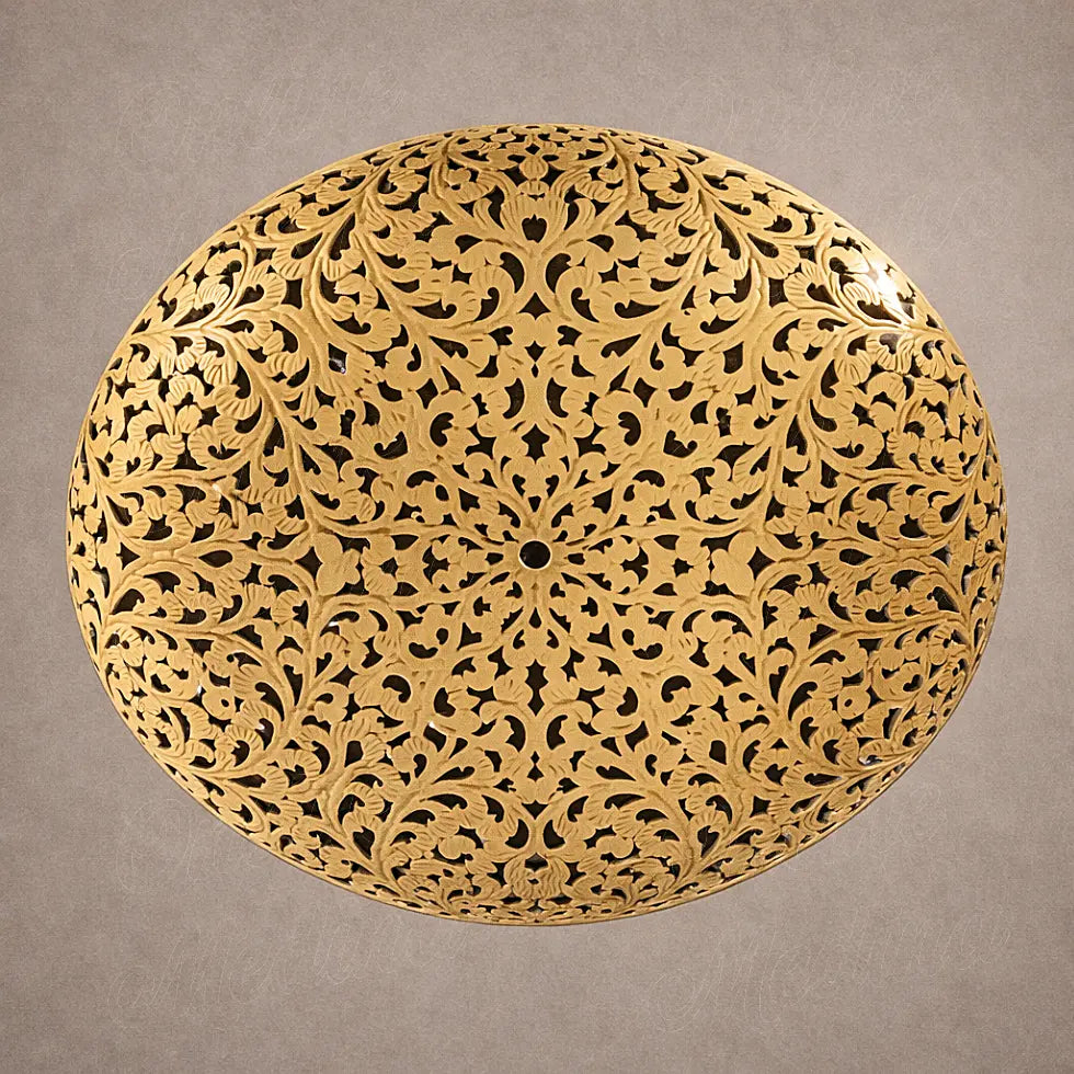 Detailed bottom view of Moroccan brass saucer pendant lamp showing handcrafted patterns