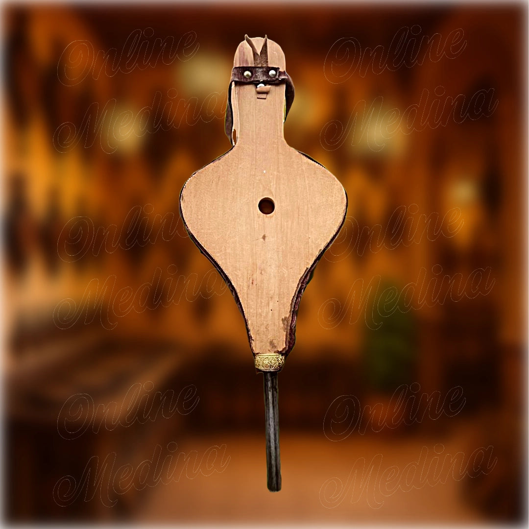 Traditional Moroccan fire blower – detailed carving in dark wood and leather, handmade bellows for fireplace or décor