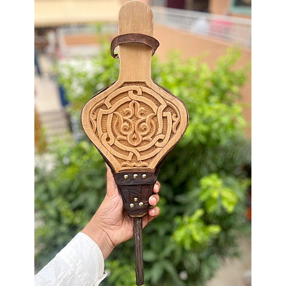 Traditional Moroccan bellows handcrafted in natural carved cedar wood with stitched leather and forged iron tip – perfect for fireplaces and home decor