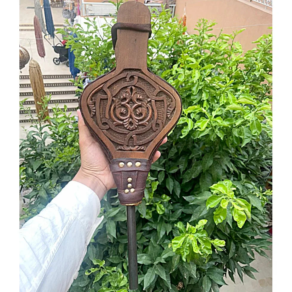 Handcrafted Moroccan bellows made from dark carved cedar wood with genuine leather details and iron nozzle – ideal for traditional fireplace use