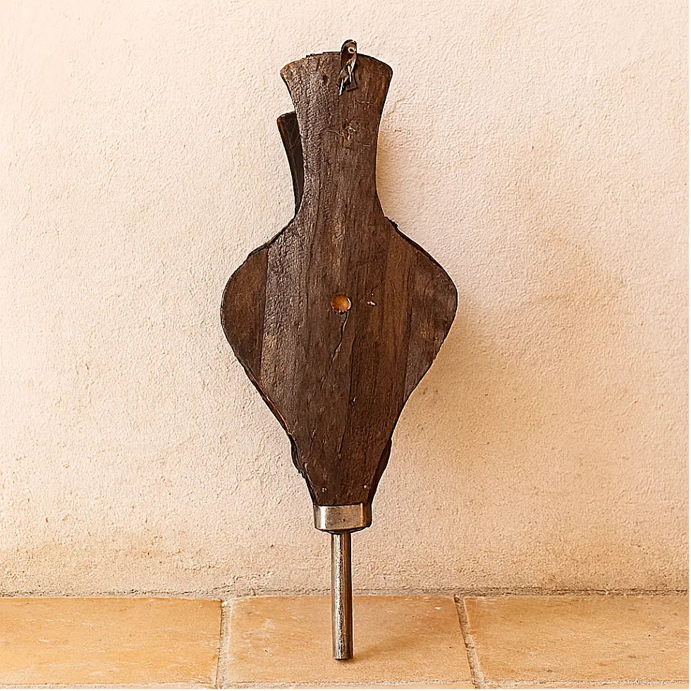 Back view of an antique Moroccan wooden bellows with forged iron nozzle, rustic handmade finish