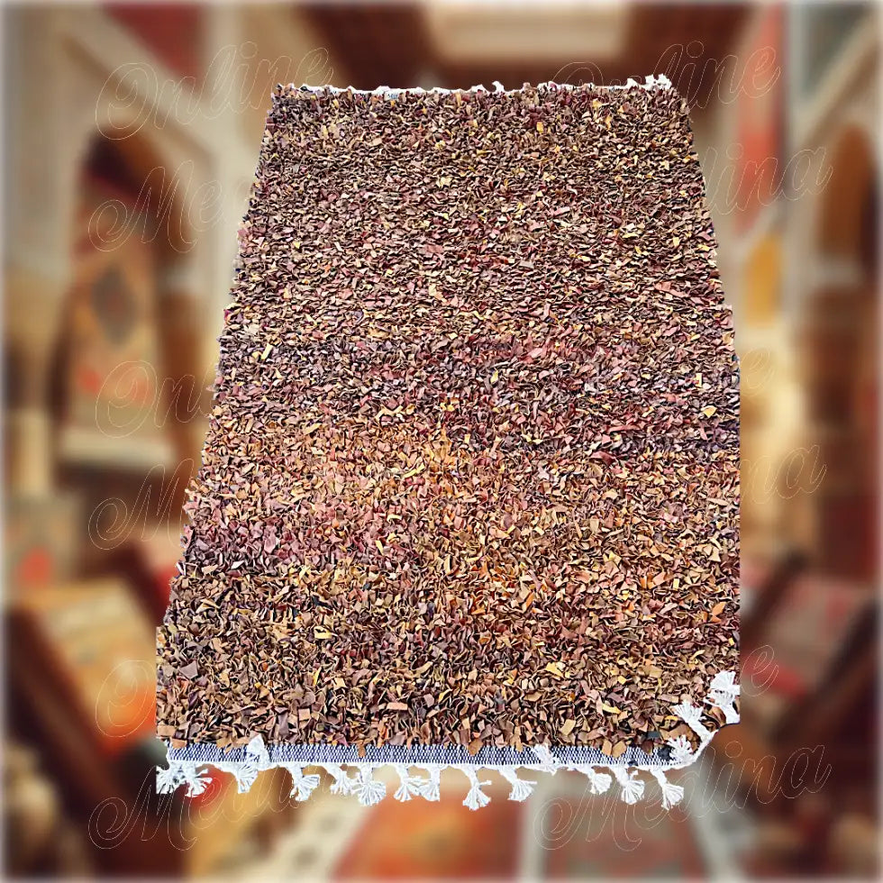 Detailed view of weaving and finishing of a Boucharouite rug made from Moroccan leather — handcrafted traditional decor.