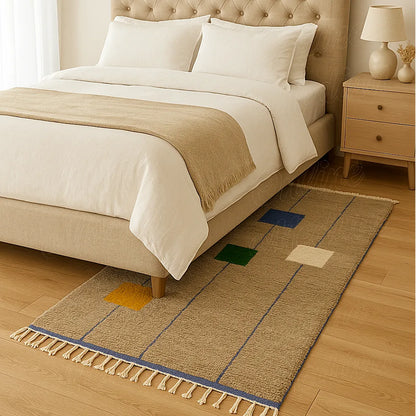 Handmade Moroccan wool rug in natural beige with colorful geometric squares, ethically woven by artisans, perfect for modern bedroom décor