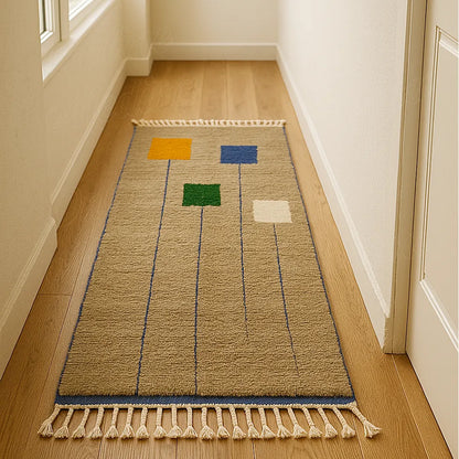 Moroccan handmade wool runner rug with blue, green, yellow, and white squares on a beige base, ideal for bright hallways and cozy interiors