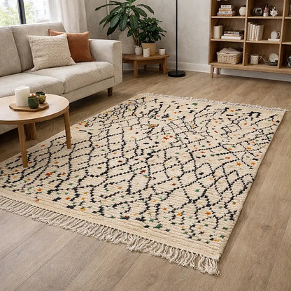 Handwoven Boujaad Azilal Berber rug in natural wool, geometric black lines with colorful accents, styled in a living room