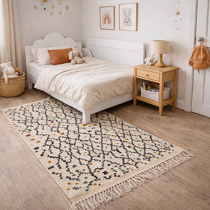 Authentic Boujaad Azilal Berber rug in wool, cream background with black patterns and colorful details, placed in a child’s bedroom