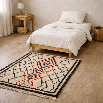 Handwoven Moroccan Berber rug blending Atlas and Rahamna tribal motifs in natural wool