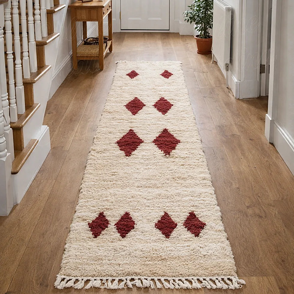 Berber runner rug with red diamond pattern in a hallway, long textured moroccan wool rug with soft finish