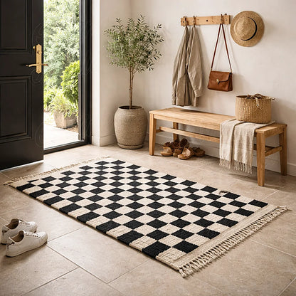 Boujaad runner rug with black and ivory checkered pattern in an entryway, long textured moroccan wool rug