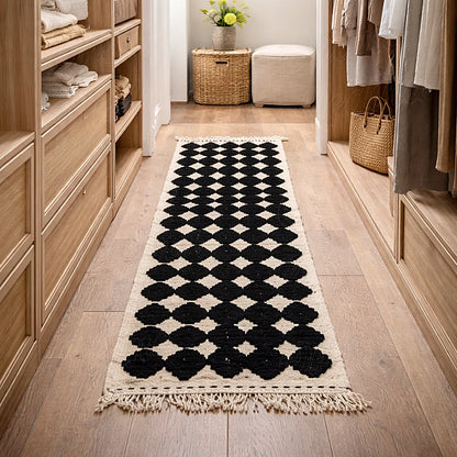 Berber runner rug with black and ivory geometric pattern in a dressing, long textured moroccan wool rug