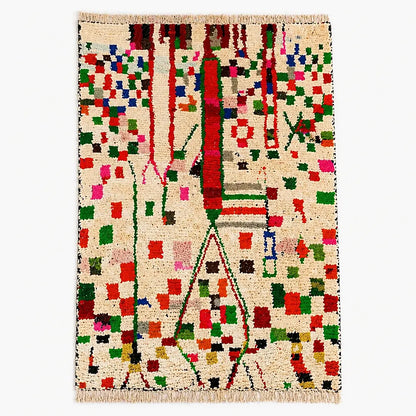 Colorful Azilal berber rug with symbolic geometric pattern on cream wool, shown in flat lay view