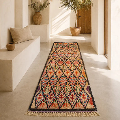 Colorful Moroccan Berber runner rug with diamond motifs in a bright hallway