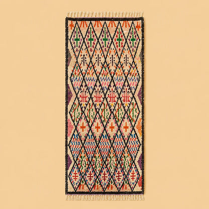 Colorful Moroccan Berber runner rug with diamond motifs on plain background