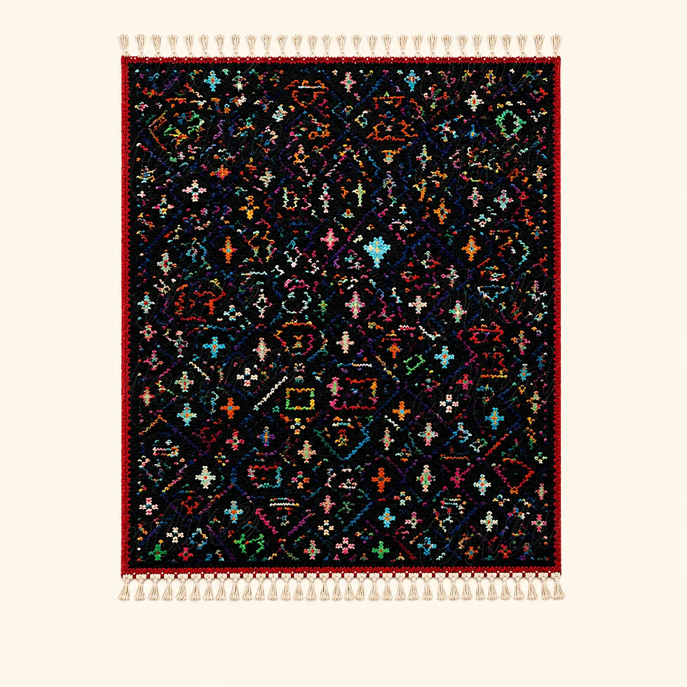 Dark Moroccan Berber wool rug with colorful tribal motifs on plain background