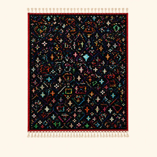 Dark Moroccan Berber wool rug with colorful tribal motifs on plain background