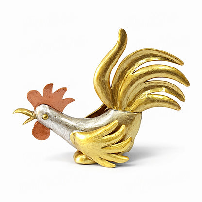 Handcrafted Moroccan mixed metal rooster sculpture in low head compact posture with brass wings and copper comb