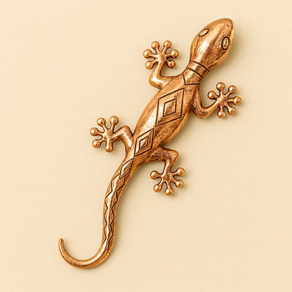 Hammered copper wall gecko with detailed texture and polished finish, handmade in Morocco