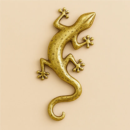 Golden brass wall lizard sculpture with smooth metallic shine, Moroccan home decor accent