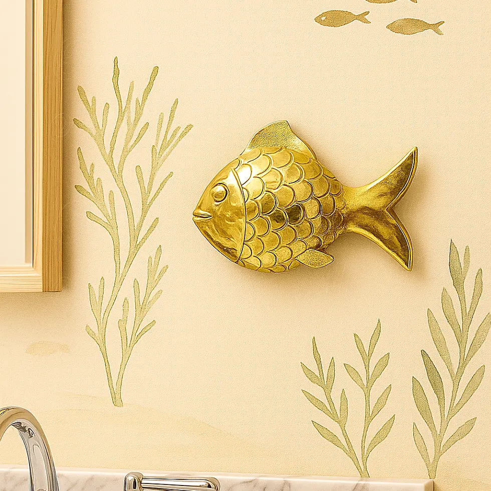 brass fish wall decor in Moroccan bathroom with marine wallpaper seaweed design