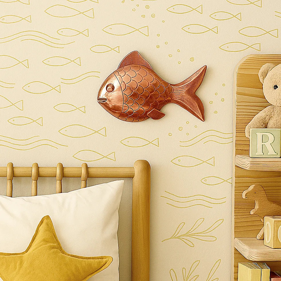 copper fish wall decor in kids bedroom with ocean themed wallpaper and toys