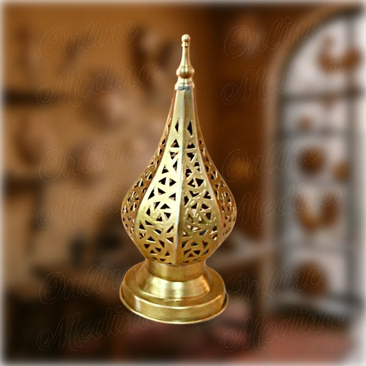 Geometric Moroccan candle holder in brass – handcrafted teardrop silhouette with pierced triangle motifs – made in Marrakech