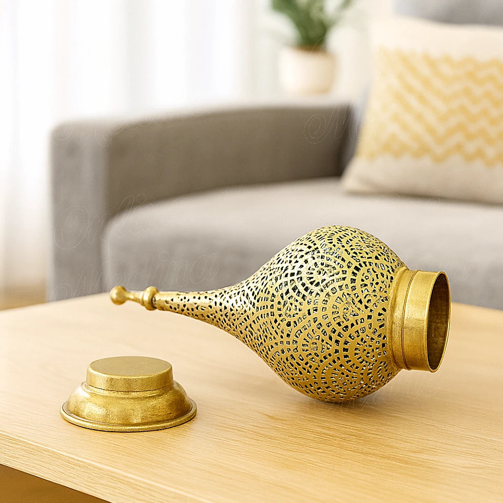 Brass Moroccan candle lantern with detachable base displayed in a bright European living room.