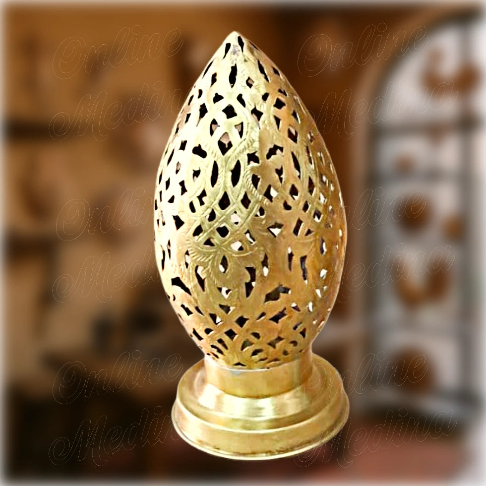Moroccan egg-shaped brass candle holder with pierced floral pattern – handcrafted metal lantern by Maître Hilab