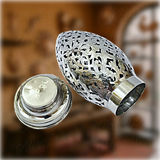 Detachable Moroccan silver egg-shaped candle holder – pierced metalwork by Maître Hilab