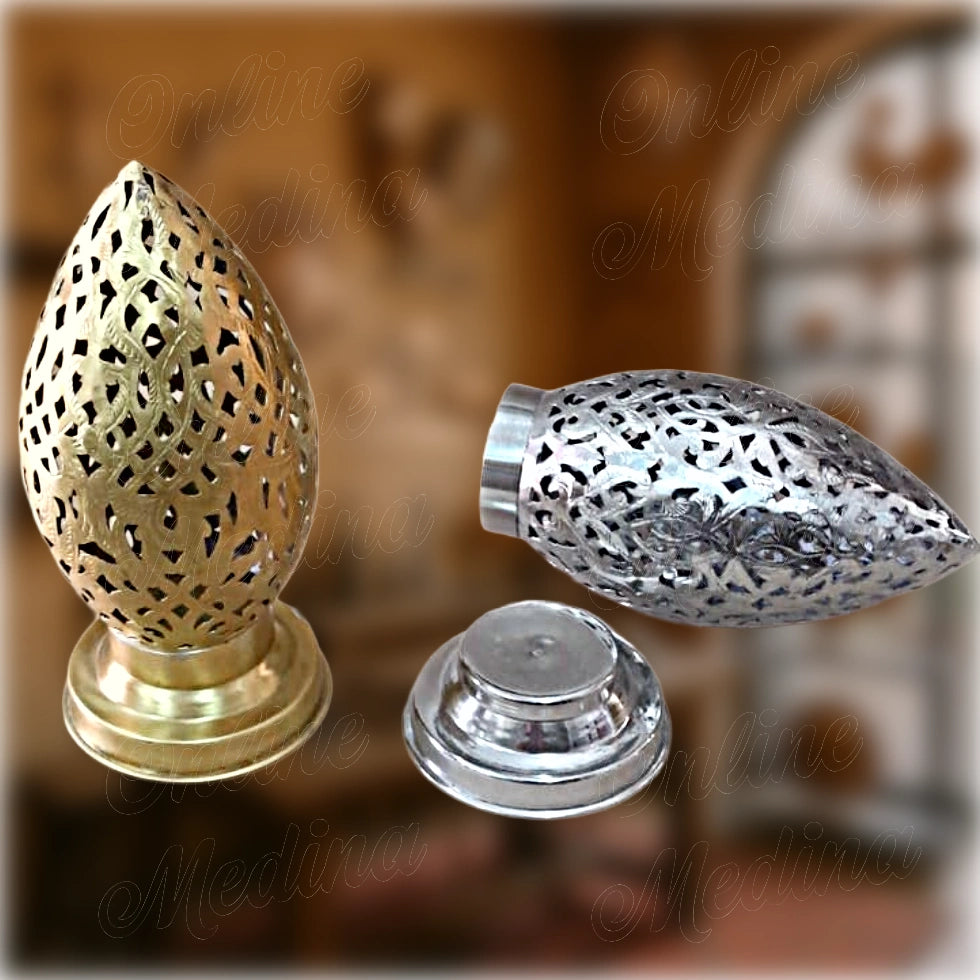 Set of Moroccan egg-shaped candle holders in brass and silver – handcrafted pierced metal design from Marrakech