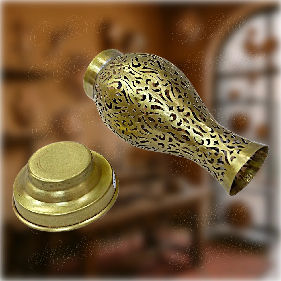Handcrafted pierced brass amphora‑style vase candle holder by Moroccan artisans