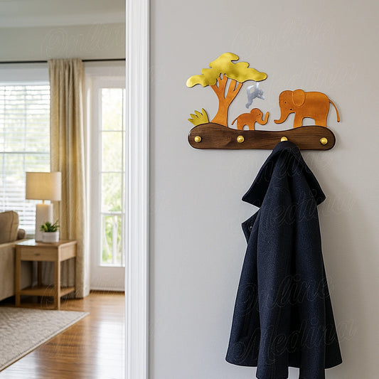 Elephant and tree metal wall coat rack with dark wood base in modern entryway