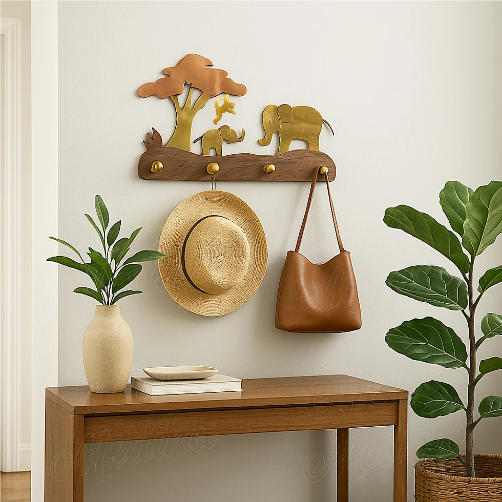 Elephant and tree wall-mounted coat rack in brass, copper and silver metals with hat and bag