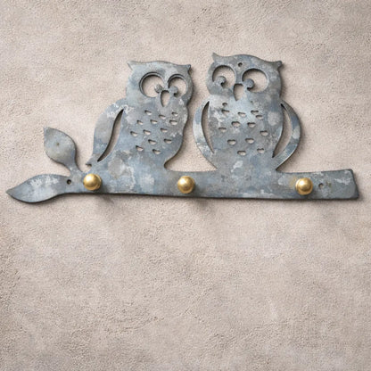 Heated galvanized owl wall key holder with thermal patina finish