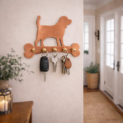 Handmade copper dog wall key holder displayed in a warm and welcoming home entryway with natural light