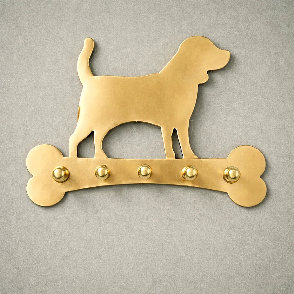 Handmade brass dog wall key holder featuring a dog silhouette and solid brass hooks
