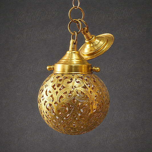 Moroccan brass hanging pendant light handmade with detailed openwork metal, showcasing artisanal craftsmanship and decorative lighting design