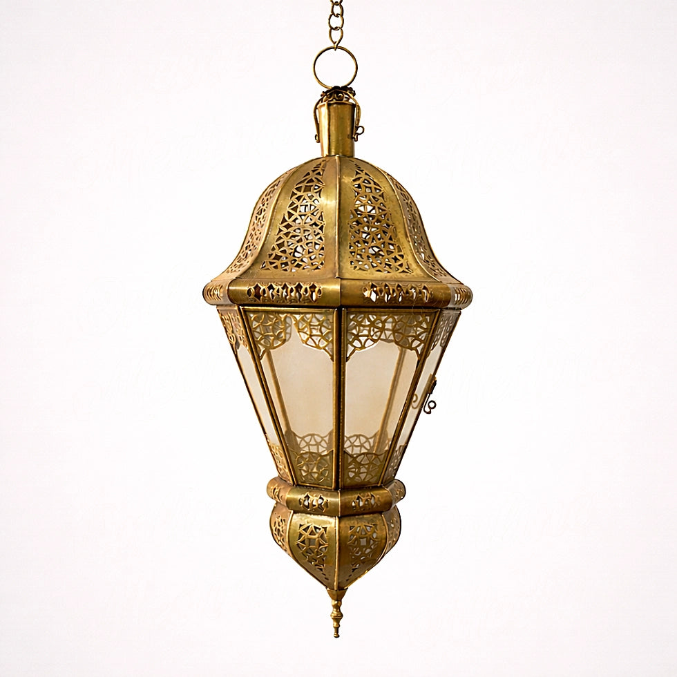 Vintage brass Moroccan pendant lantern with detailed metalwork and glass panels on neutral background