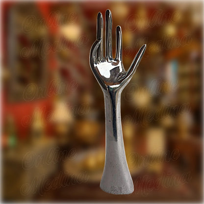 Front-facing view of Moroccan metal hand statue by master artisan Slwak – handmade in aluminum using traditional dinanderie techniques