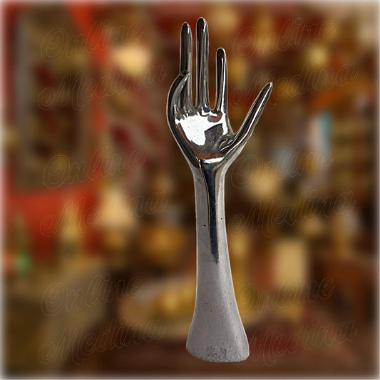 Front-facing view of Moroccan metal hand statue by master artisan Slwak – handmade in aluminum using traditional dinanderie techniques