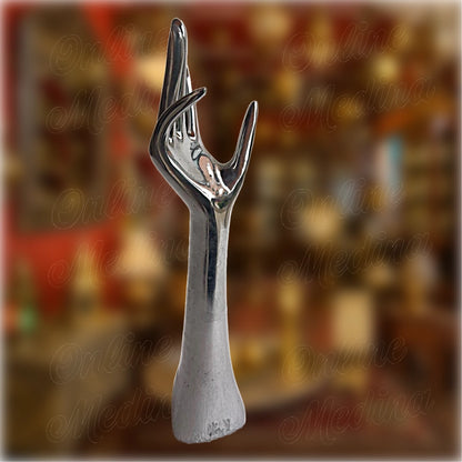 Engraved copper version of the artisan hand sculpture – traditional Moroccan metalwork with floral motifs and spiritual symbolism