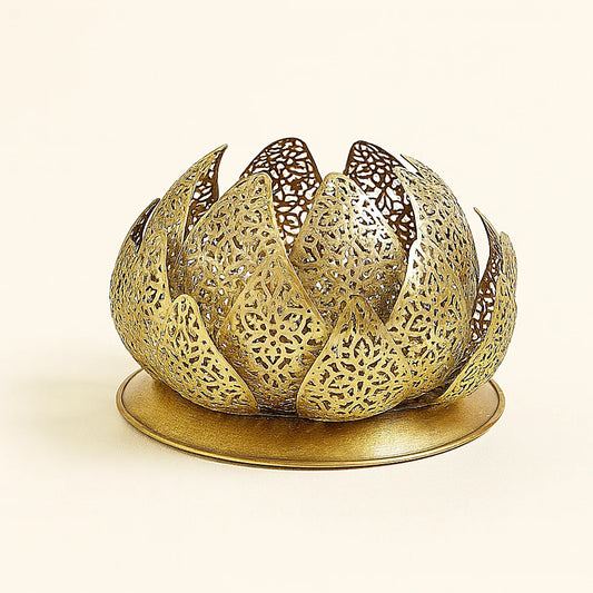 Handcrafted brass Moroccan lamp in a lotus flower shape, featuring intricate pierced metalwork and a slightly domed base, displayed on a plain beige background for e-commerce photography