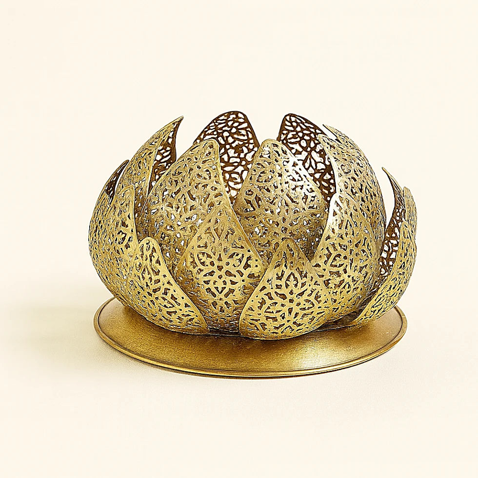 Handcrafted brass Moroccan lamp in a lotus flower shape, featuring intricate pierced metalwork and a slightly domed base, displayed on a plain beige background for e-commerce photography