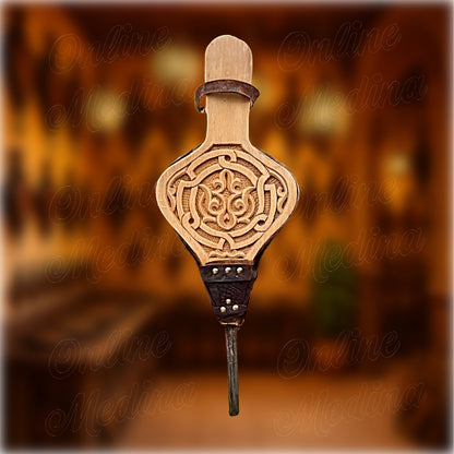 Handcrafted Moroccan bellows – front view of traditional fire blower in carved wood and leather, made in Marrakech