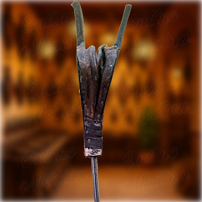Side view of henna-colored Moroccan bellows – handstitched leather and iron nozzle – traditional fireplace accessory