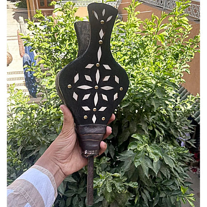 Back view of Moroccan fireplace bellows in blackened wood with decorative white bone inlay and brass studs – elegant and functional home accessory