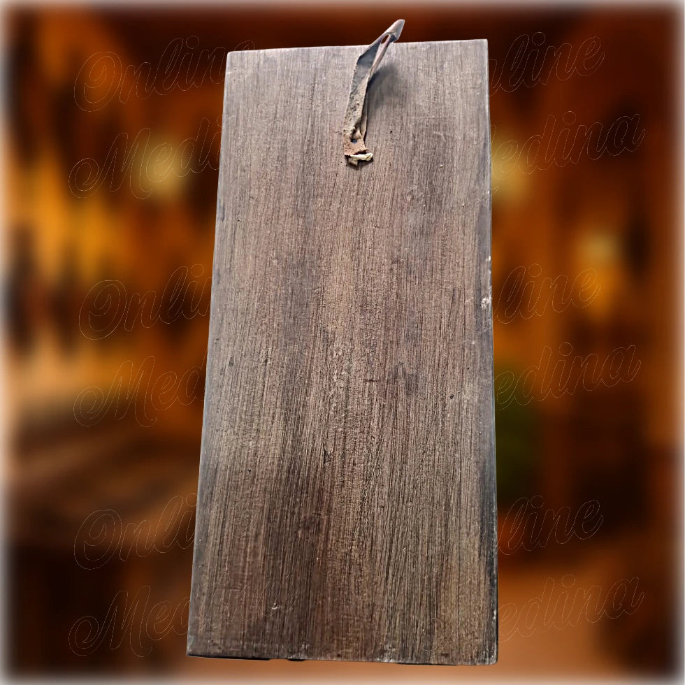 Back of Berber wooden wall amulet in brown stained cedar wood with integrated hanging loop, handcrafted Moroccan Amazigh wall decor by Online Medina
