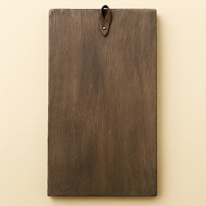Back view of Berber wooden wall amulet showing natural wood texture and leather hanging loop