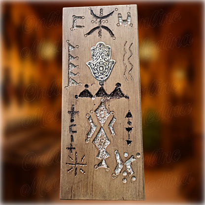 Berber wooden wall amulet in light cedar wood with engraved Amazigh motifs and central Hamsa hand symbol, handcrafted Moroccan wall decoration by Online Medina