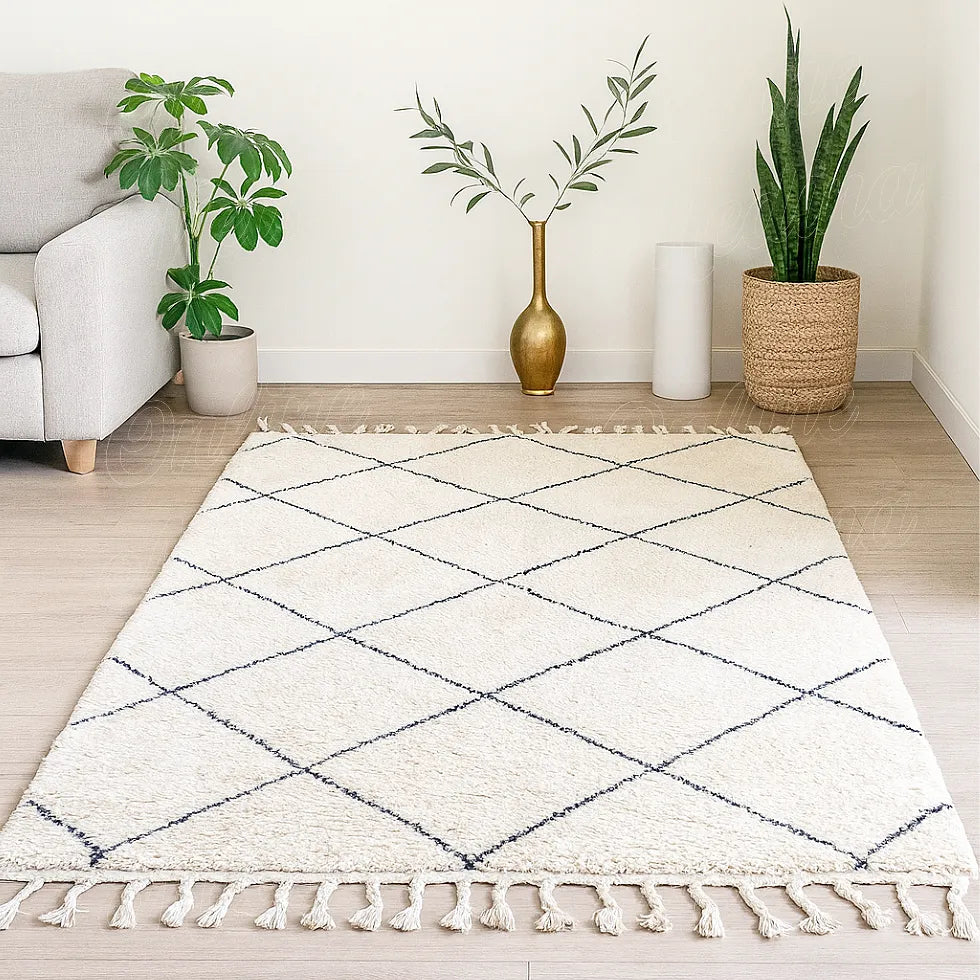 Handwoven Beni Ourain rug with black diamond pattern in a bright modern living room